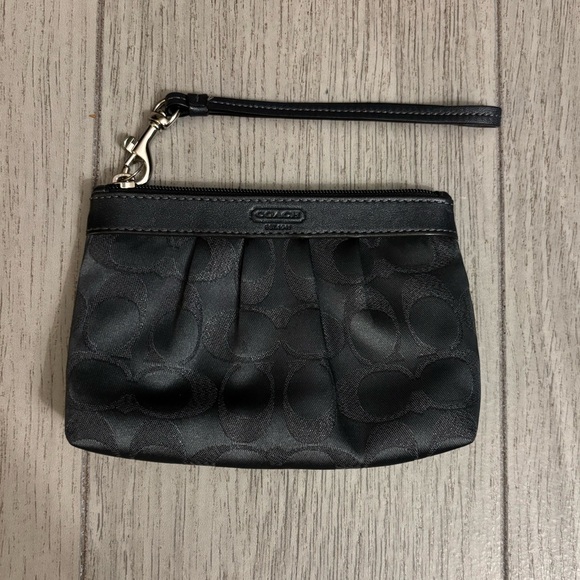 Coach Handbags - Coach Wristlet in black - EUC.